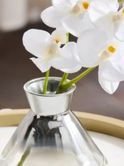 Artificial Orchid In Small Glass Vase