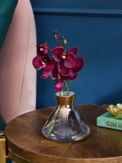 Artificial Orchid In Small Glass Vase