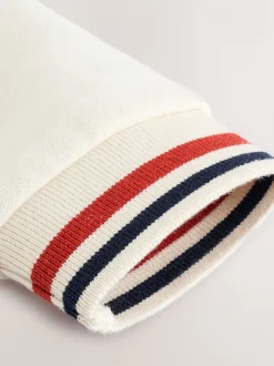 Baker by Ted Baker kiezelkleurig marineblauw en rood varsity-rompertje