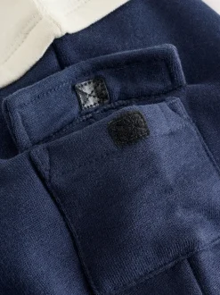 Baker by Ted Baker kiezelkleurig marineblauw en rood varsity-rompertje