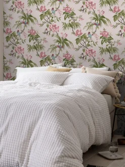 Behang met vogels en bloemen