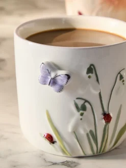 Beker met bloemen en wilde dieren