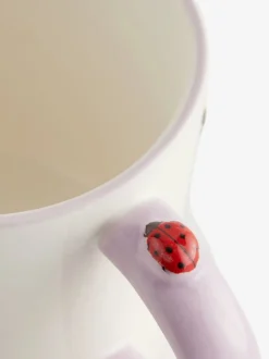 Beker met bloemen en wilde dieren