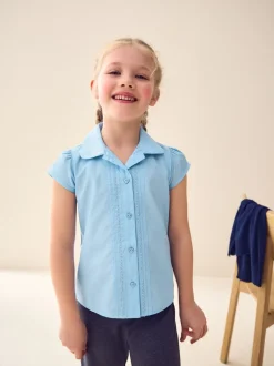 Blauw - Schoolblouse met pofmouwen en kantafwerking (3-14 jr)