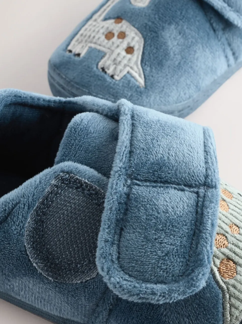 Blauw met dinosaurus - Warm gevoerde pantoffels met kuipzool