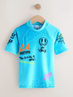 Blauw met graffitiprint - Surfhemdje (1,5 - 16 jr)