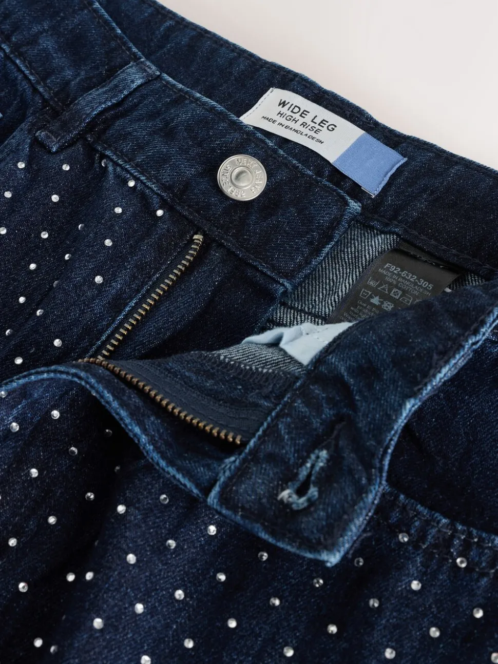 Blauw met wassing - Versierde jeans met wijde pijpen