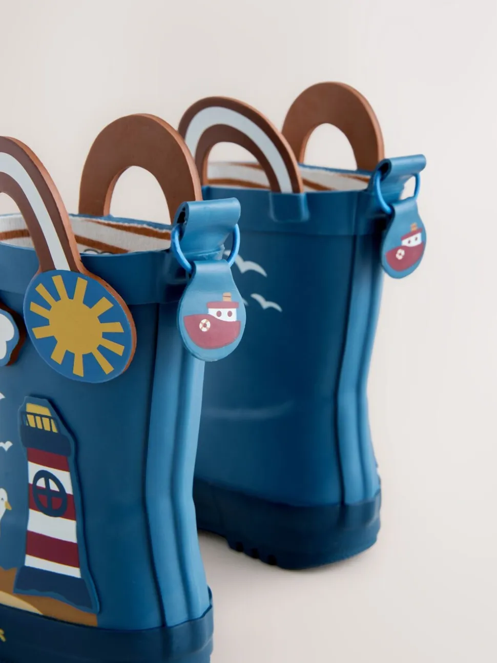 Blauw voor op het strand - Aantreklaarzen met handvat