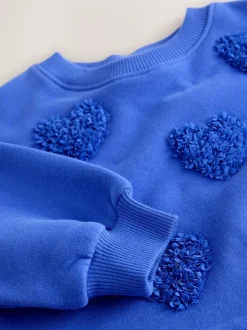 Blauwe hartjes - Feestjurk van sweaterstof (3 mnd-7 jr)