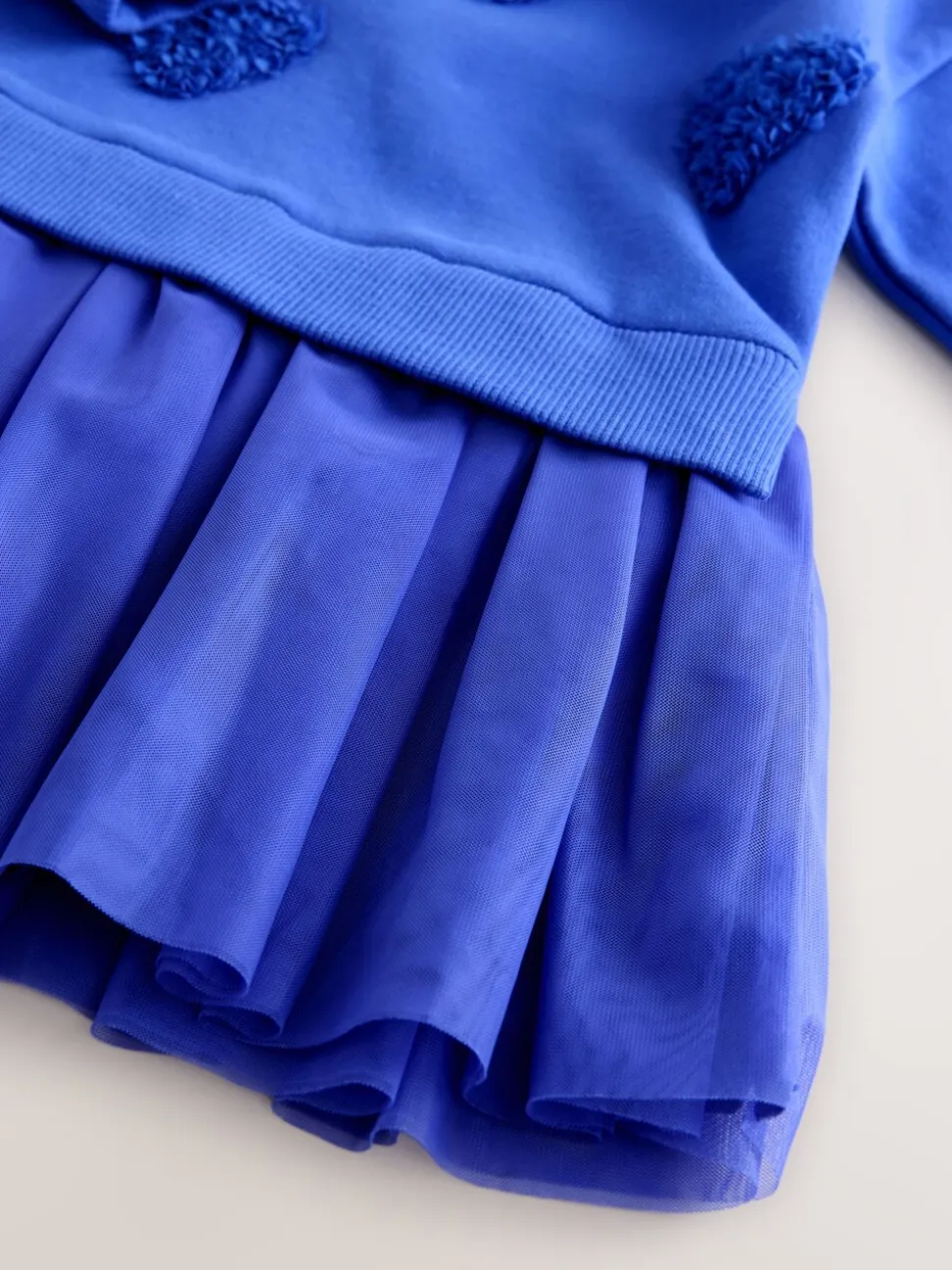 Blauwe hartjes - Feestjurk van sweaterstof (3 mnd-7 jr)