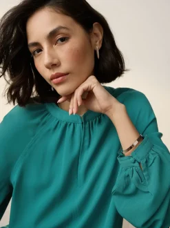 Blauwgroen - Blouse met V-hals en lange mouwen