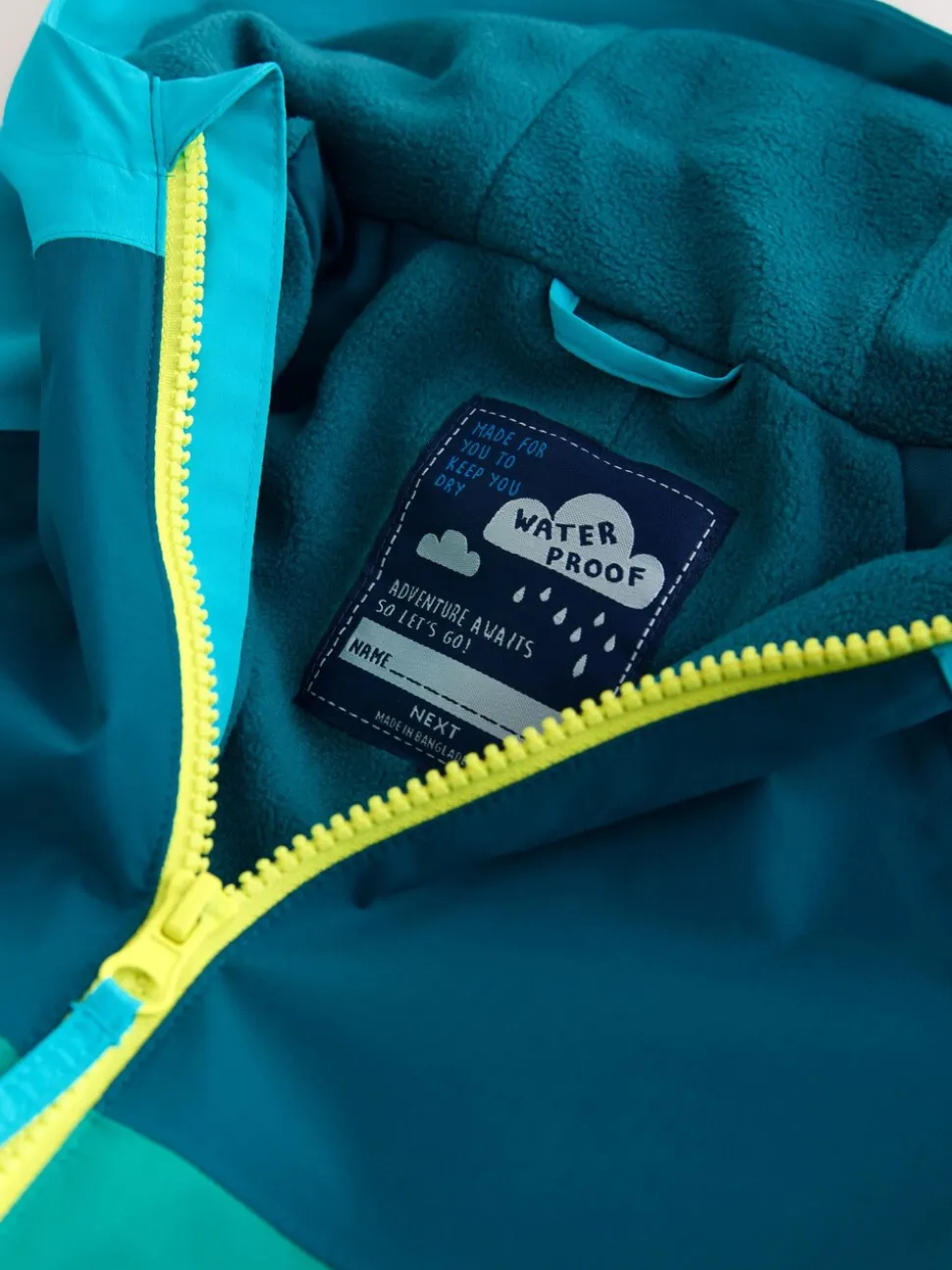 Blauw/Groen - Colourblock Puddlesuit (3mths-7yrs)