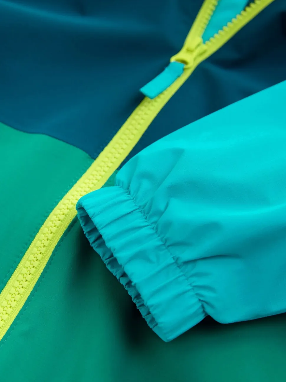 Blauw/Groen - Colourblock Puddlesuit (3mths-7yrs)