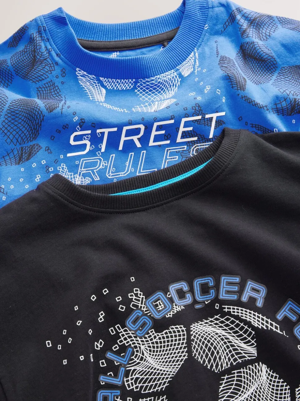 Blauw/zwart met voetbal - Verpakking van 2 pyjama's met lange mouwen (3-16 jr)