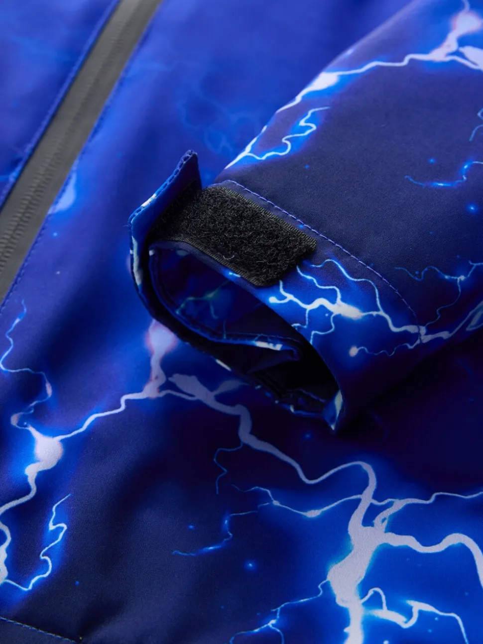 Blue Lightning Print - Waterdichte jas met fleece voering en capuchon (3-17jr)