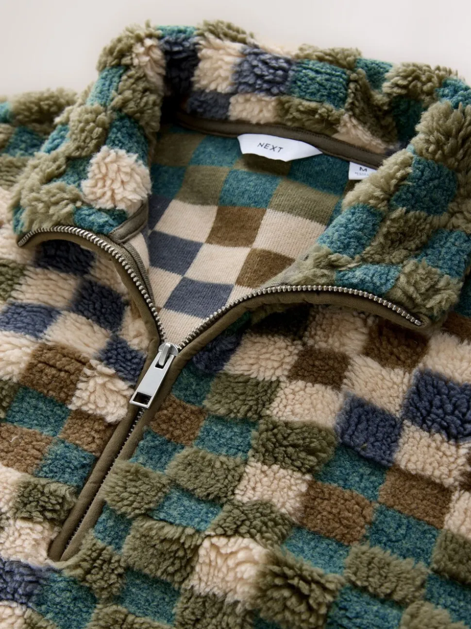 Blue/Tan Checkerboard - Half met rits - Fleece trui met print