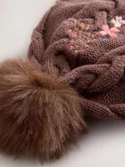 Bruin - Baby muts met geborduurde bloemen en pompon (0mnd-2jr)