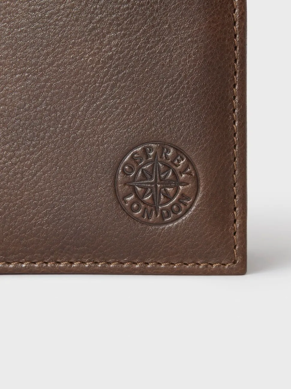 Bruin - Osprey London The Compass leren muntenportemonnee