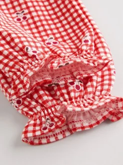 Crème beer/ rode kersen geruit - Verpakking van 2 jersey babyjurkjes (0 mnd-2 jr)