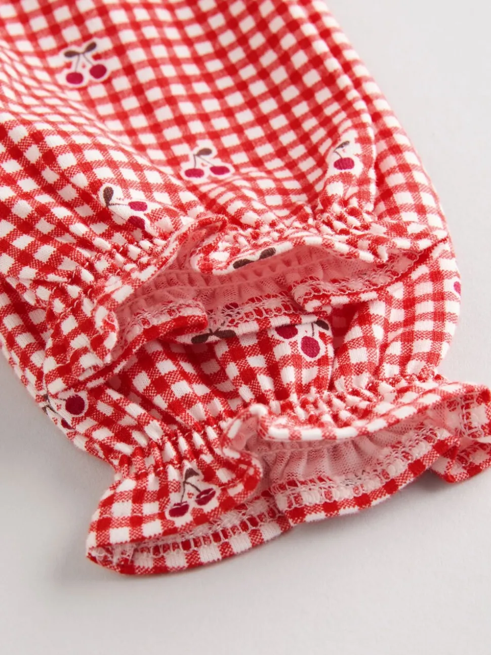 Crème beer/ rode kersen geruit - Verpakking van 2 jersey babyjurkjes (0 mnd-2 jr)