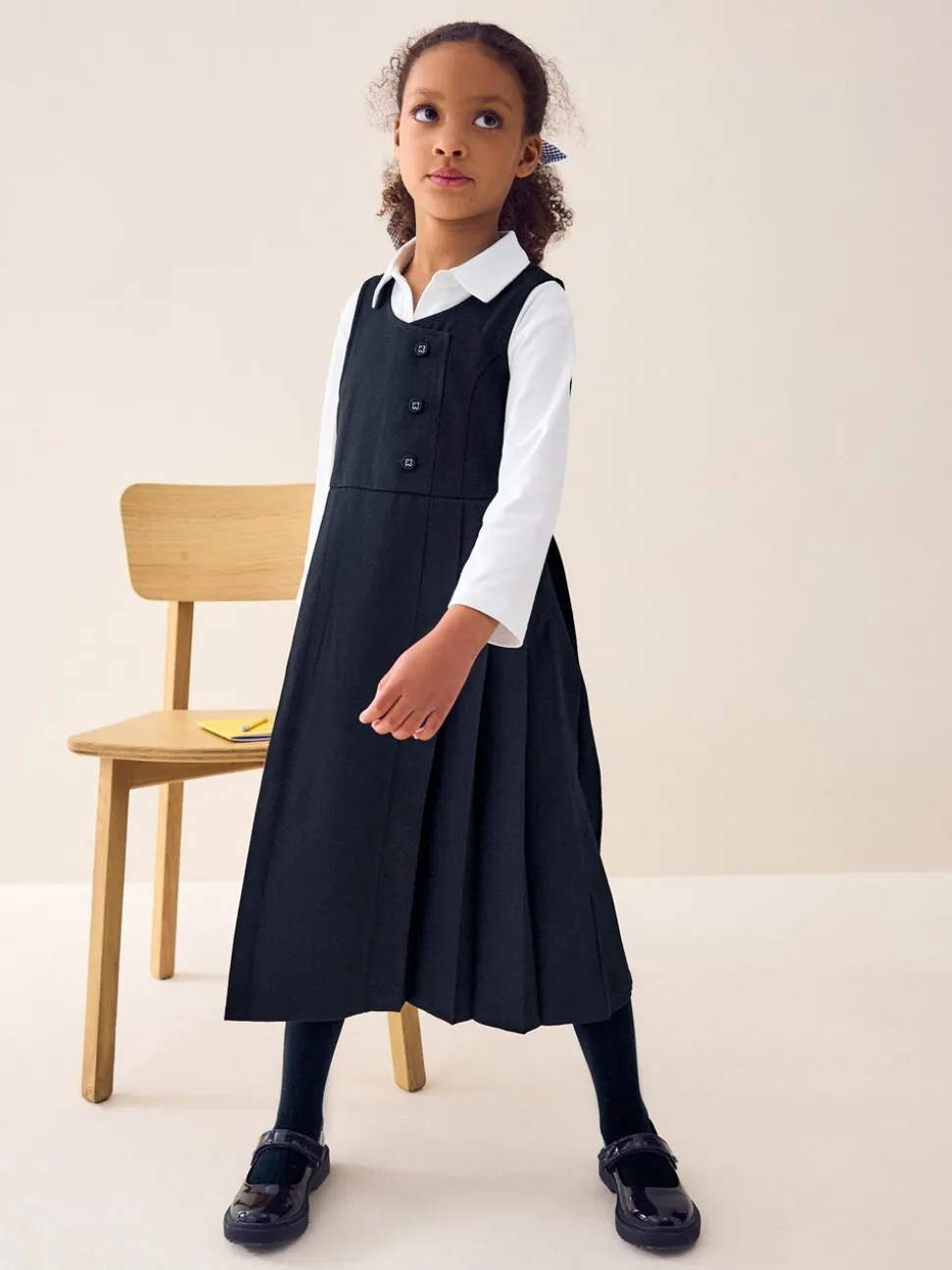 Donkerblauw - Asymmetrische lange schoolovergooier met knoopsluiting aan de voorkant (3-14jr)