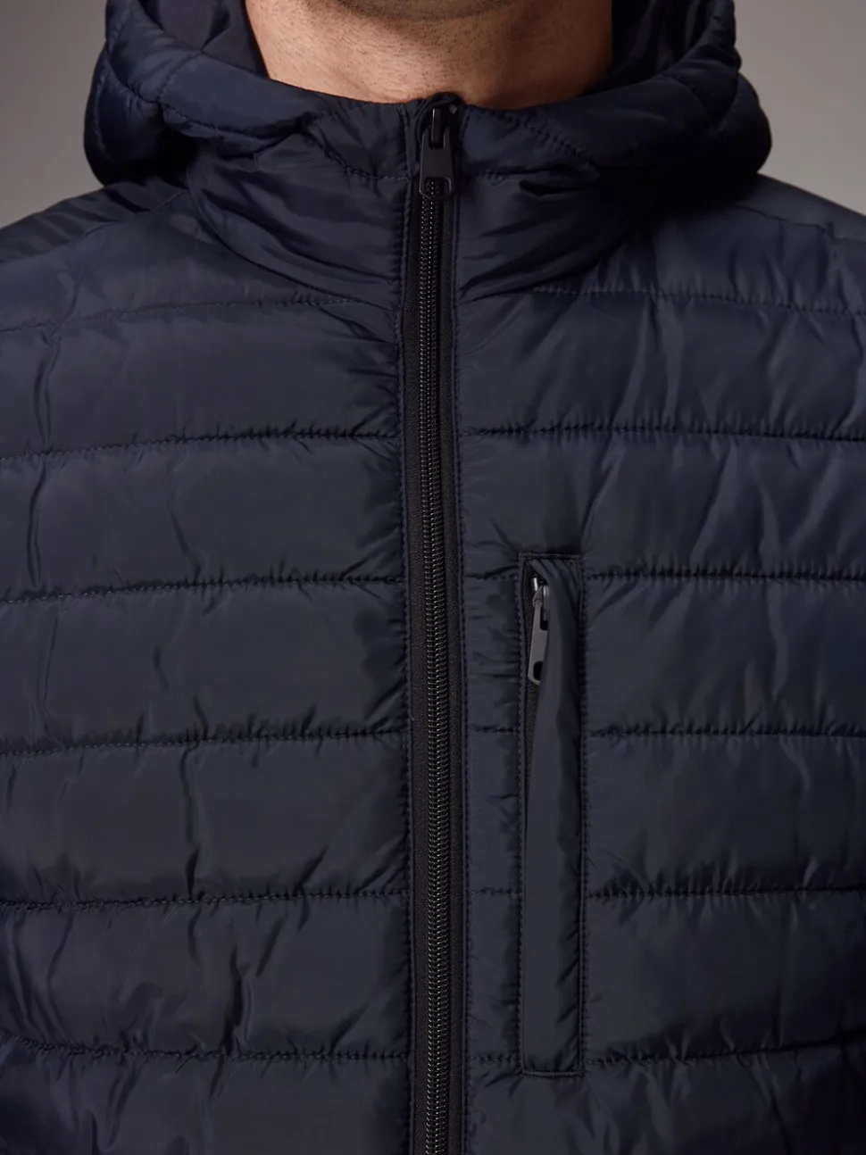 Donkerblauw - Douchebestendige lichtgewicht pufferjas met capuchon