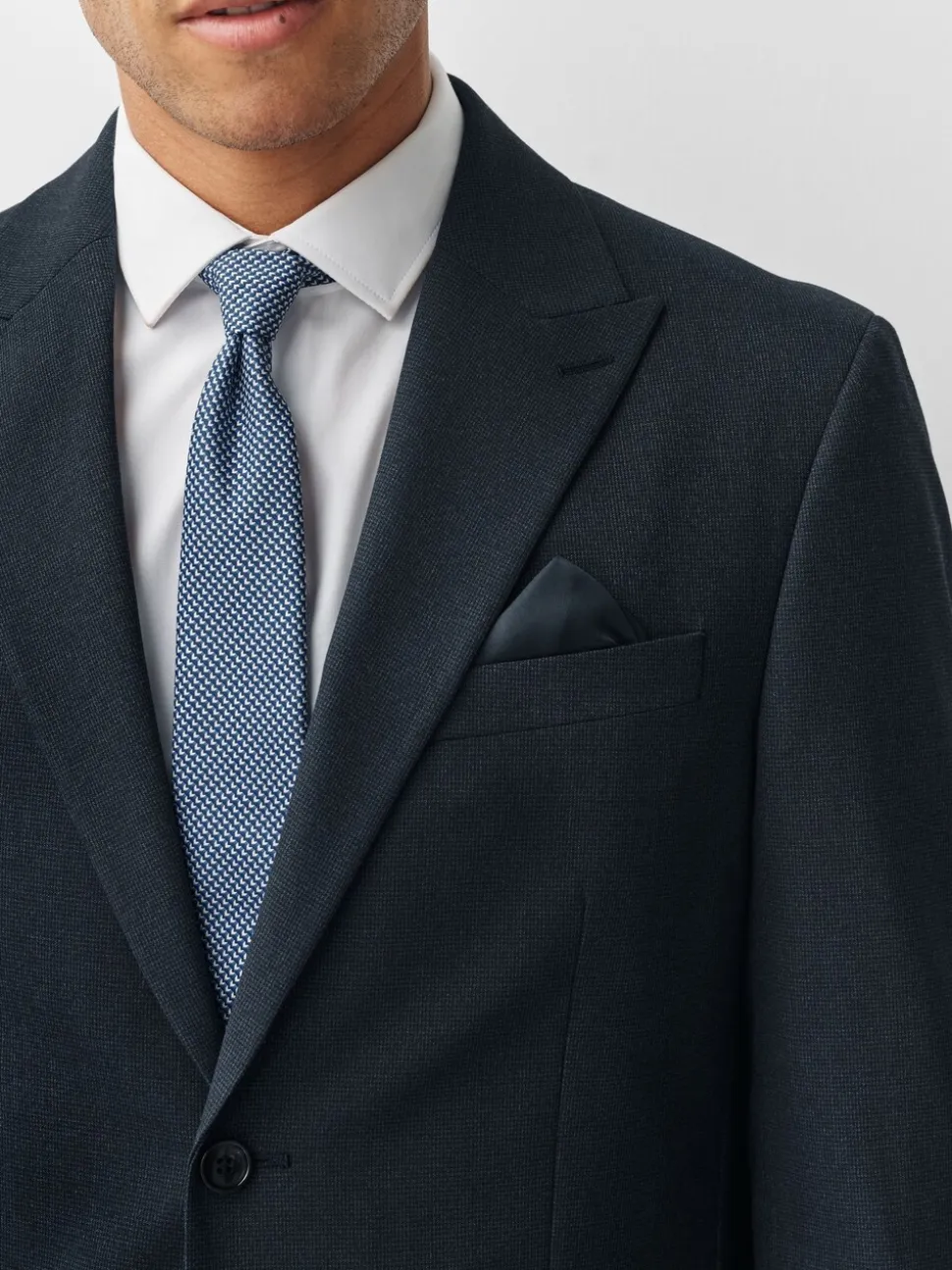 Donkerblauw - Regular fit Motionflex colbert met puppytooth-textuur