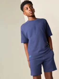 Donkerblauw - Set van T-shirt met textuur en korte mouwen en shorts (3 - 16 jr)