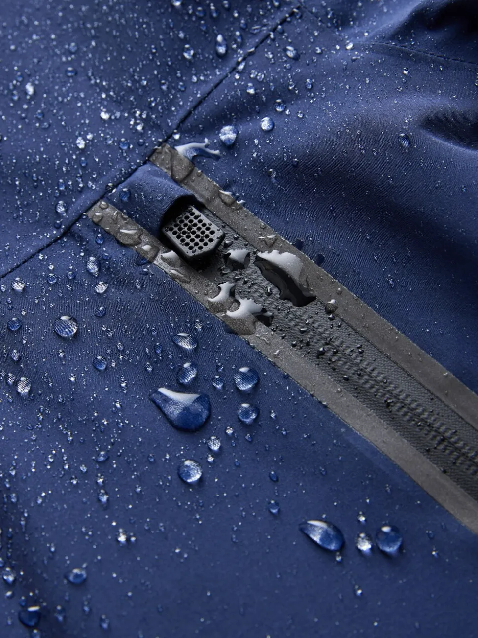Donkerblauw - Waterdichte jas met fleece voering en capuchon (3-17jr)