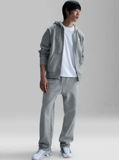 Donkergrijs gemêleerd - Nike Club Fleece joggingbroek met wijde pijpen
