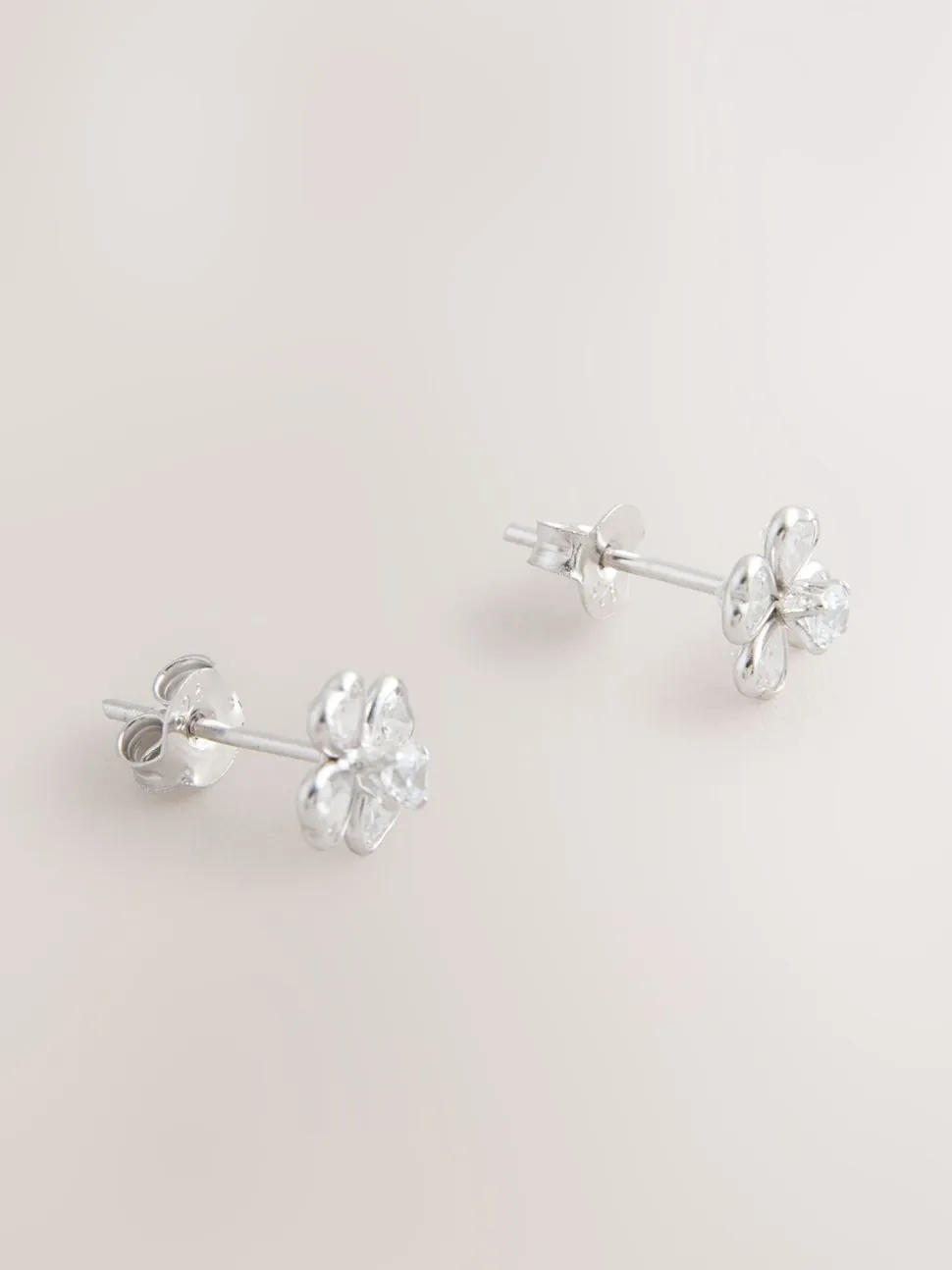 Echt zilver - Glinsterende oorknopjes met bloem