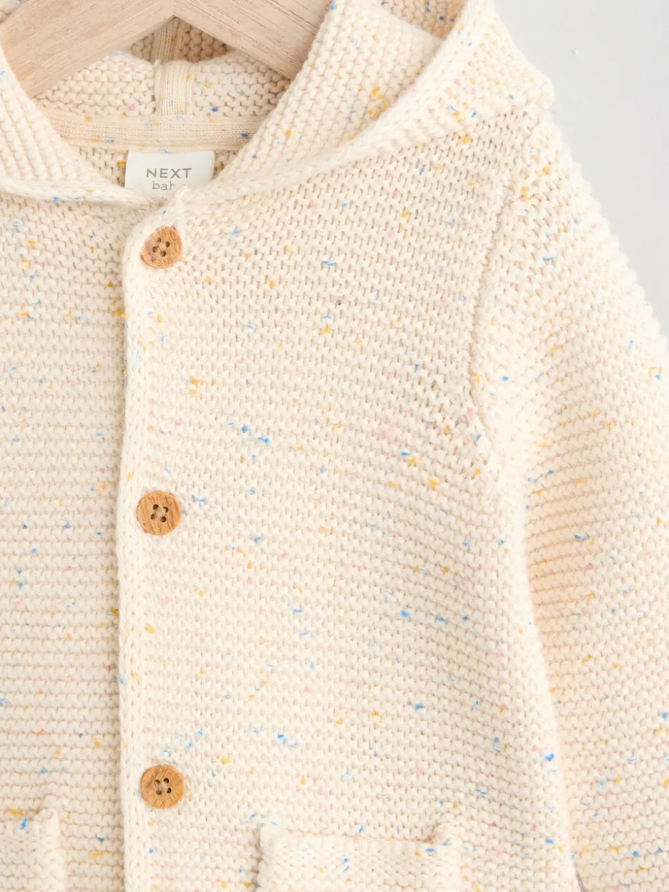 Ecru gemêleerd - Gebreid babyvest met capuchon