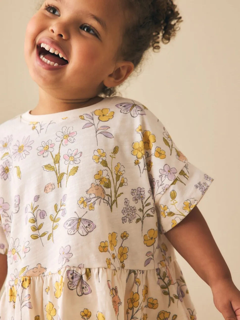 Ecru met bloemenprint - T-shirt met peplum en korte mouwen (3mnd -7jr)