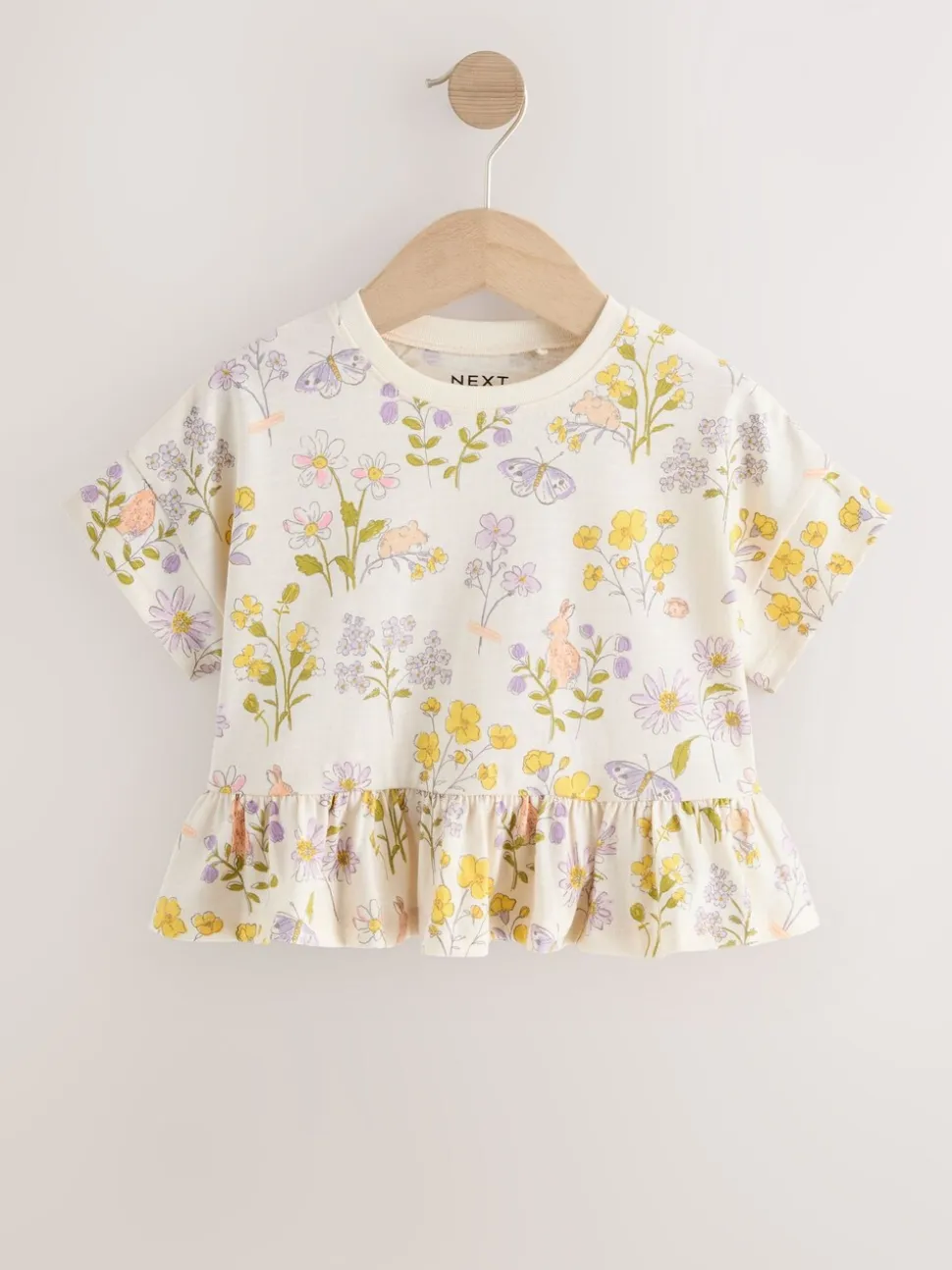 Ecru met bloemenprint - T-shirt met peplum en korte mouwen (3mnd -7jr)