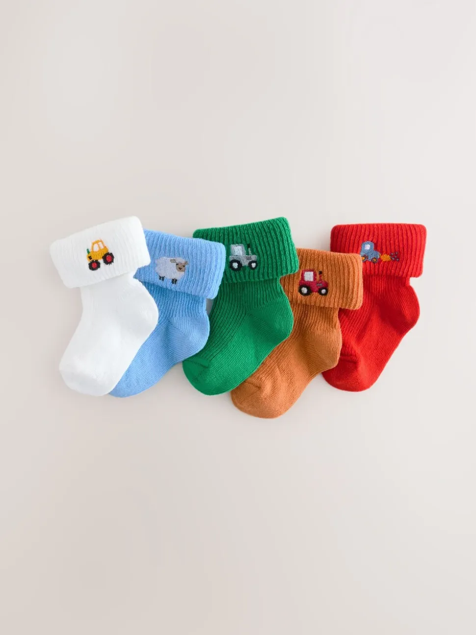 Felgekleurd met figuurtjes - Set van 5 geborduurde sokken met omslag (0mnd-2jr)