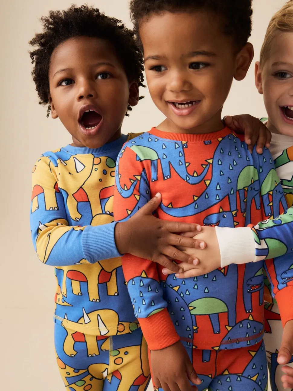 Felkleurig met dinosaurusprint - Verpakking van 3 knusse pyjama's (9 mnd-10 jr)
