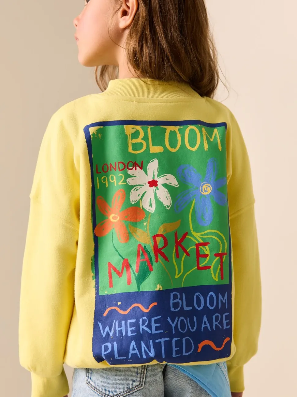 Geel met bloem - Sweatshirt (3 - 16 jr)