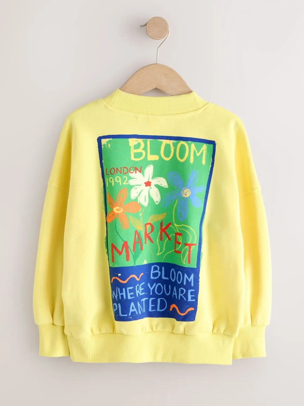 Geel met bloem - Sweatshirt (3 - 16 jr)