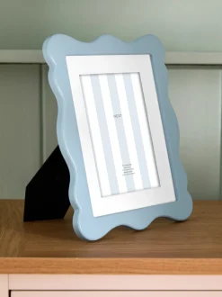 Golvend houten fotolijst