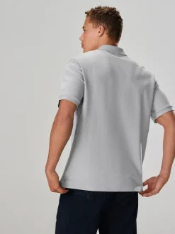 Grijs - Smart poloshirt met textuur en rits