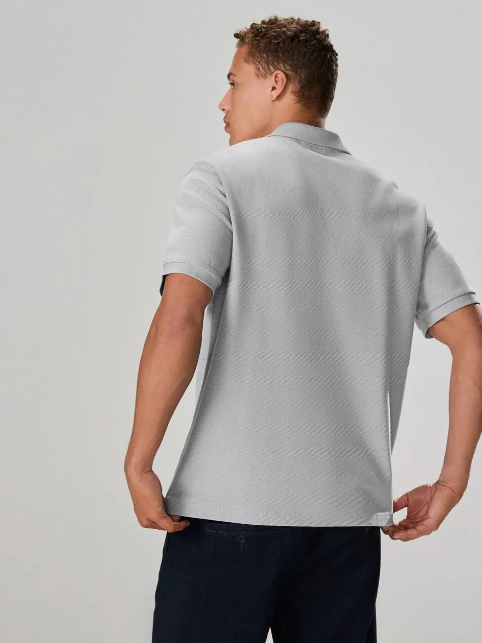 Grijs - Smart poloshirt met textuur en rits