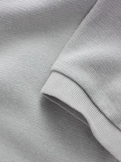 Grijs - Smart poloshirt met textuur en rits
