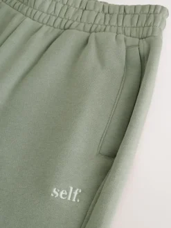 Grijs-groen - Self. joggingbroek met boorden