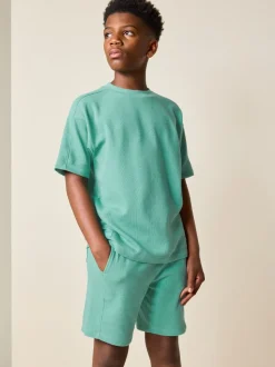 Groen - Set van T-shirt met textuur en korte mouwen en shorts (3 - 16 jr)