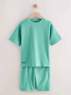 Groen - Set van T-shirt met textuur en korte mouwen en shorts (3 - 16 jr)