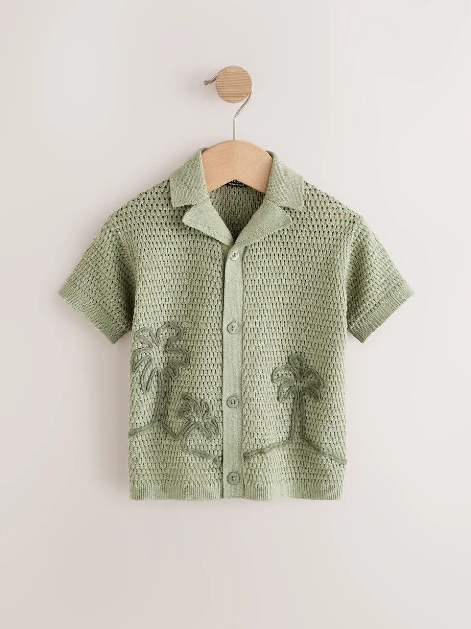Groen met palmenprint - Gebreid poloshirt met reverskraag en korte mouwen met textuur (3mnd -7jr)
