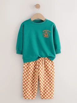Groene croissant - Set met sweatshirt en joggingbroek met strepen (3mnd-7jr)
