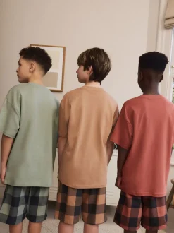 Groen/oranje - Set van 3 geweven geruite pyjama's (3-16 jr)