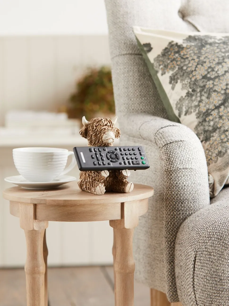 Hamish the Highland Cow tv-houder met afstandsbediening