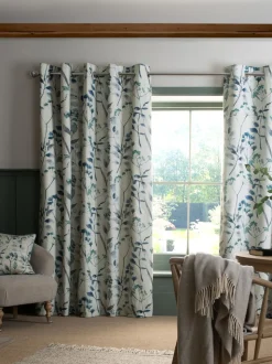 Isla ringgordijnen met bloemenprint